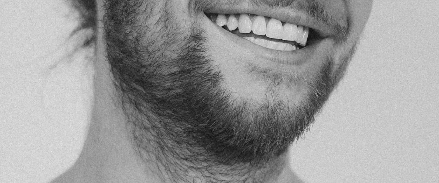 Close up of man's face with a stubble beard